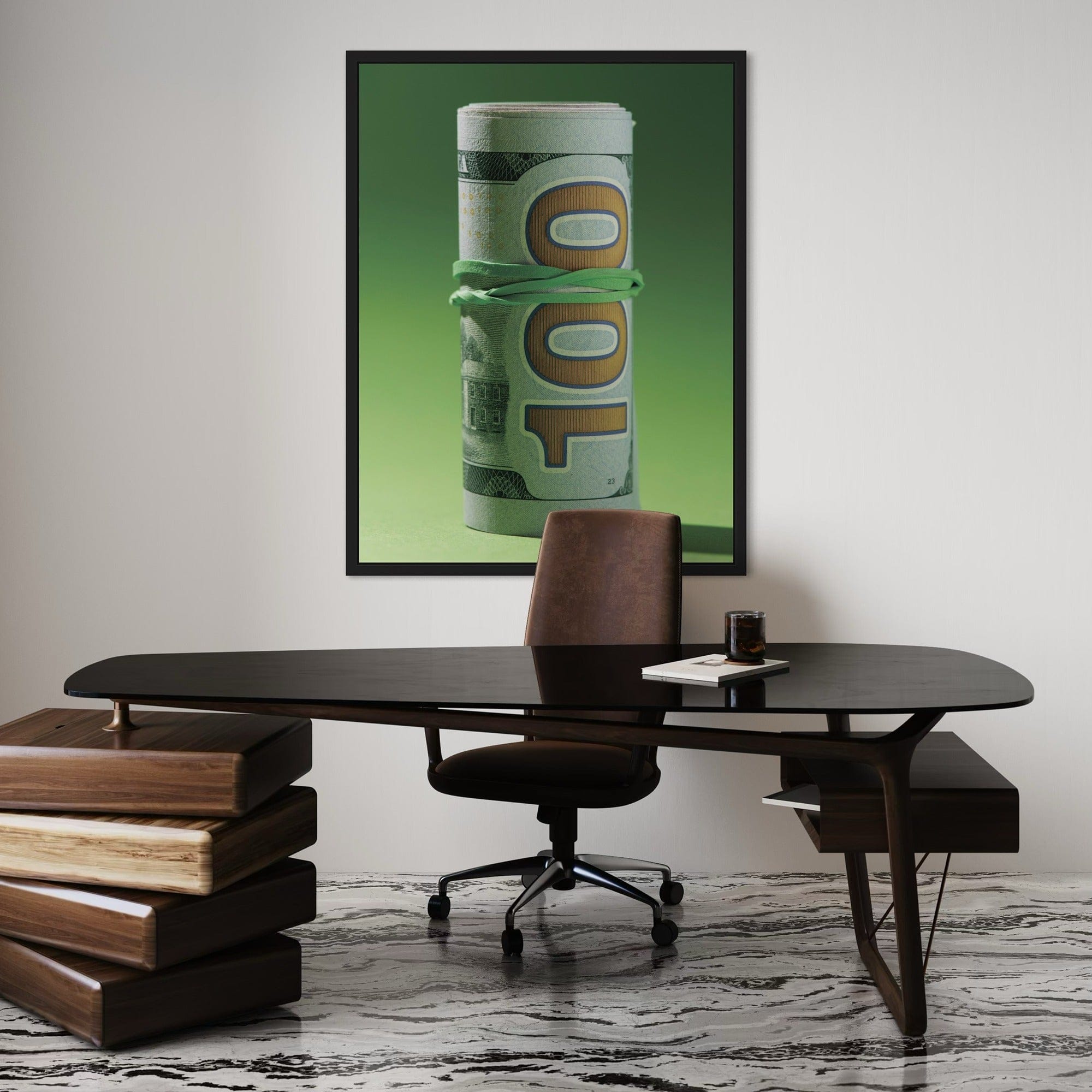 Large money canvas art showing scale above modern office workspace