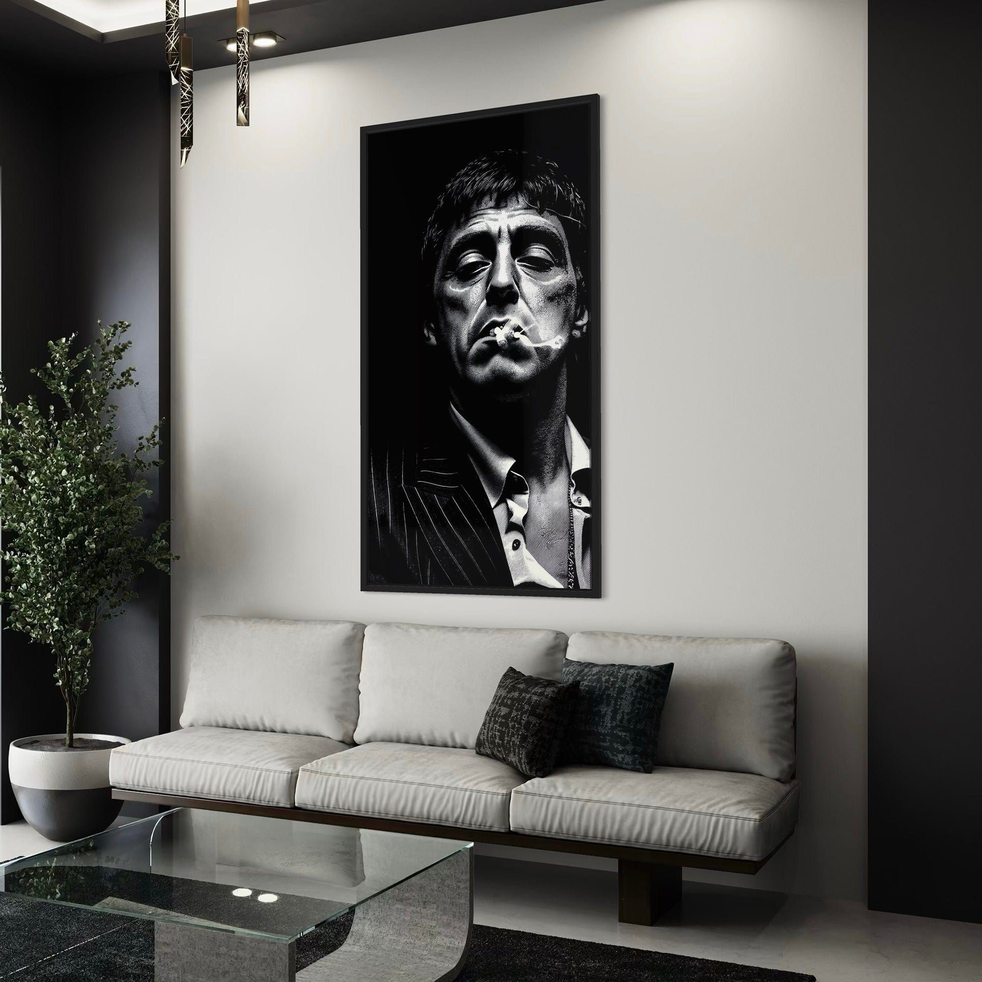 Living room with a large framed portrait of a man smoking on the wall above a sofa.