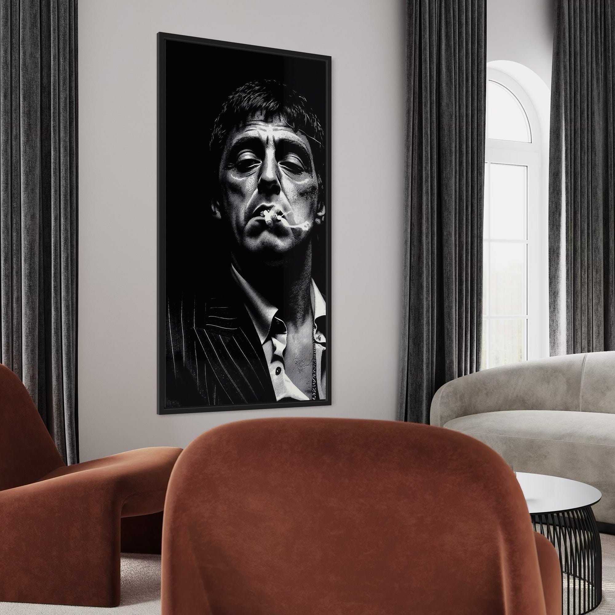 Framed black and white portrait of a man in a modern living room.