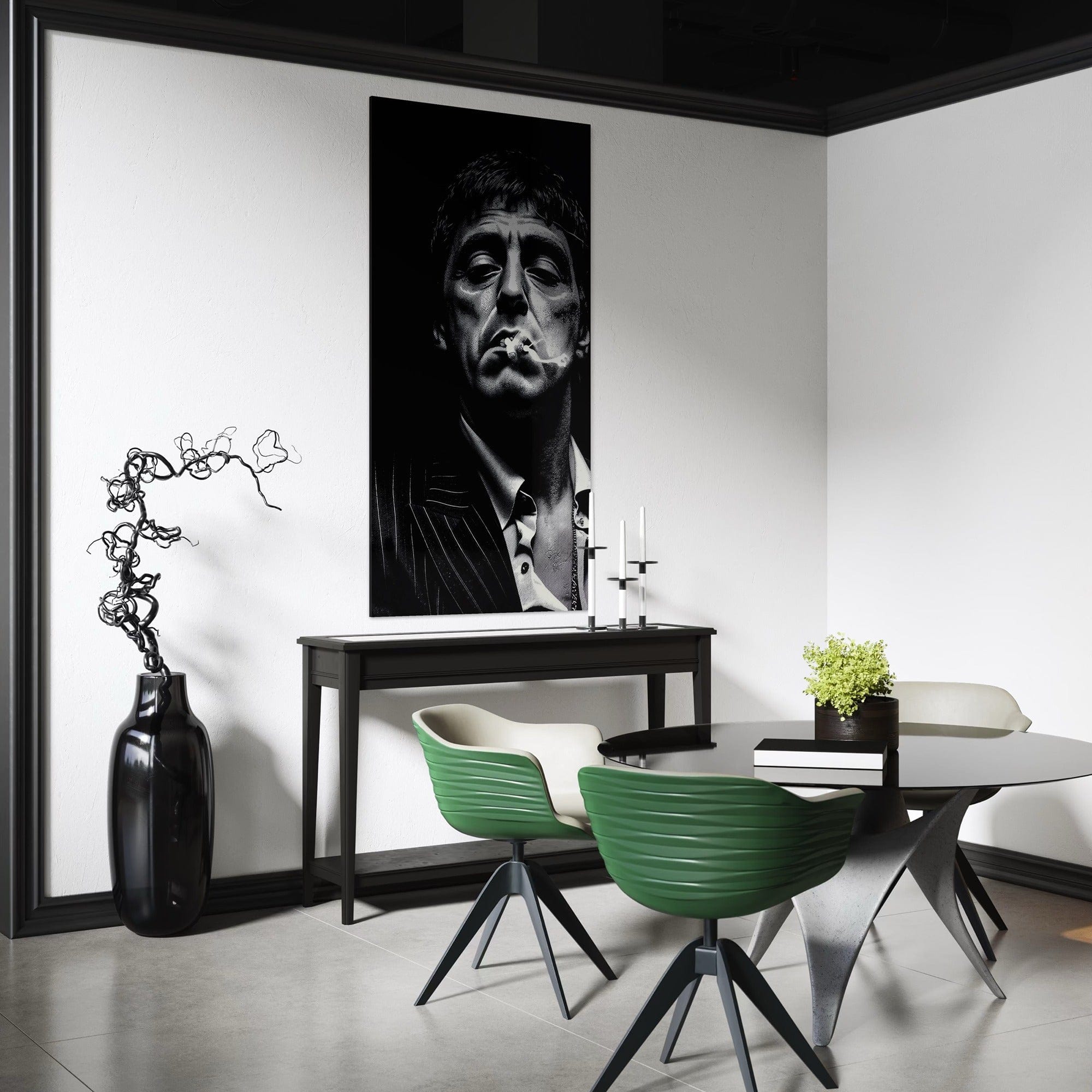 Modern interior with a black and white portrait, green chairs, and a table.