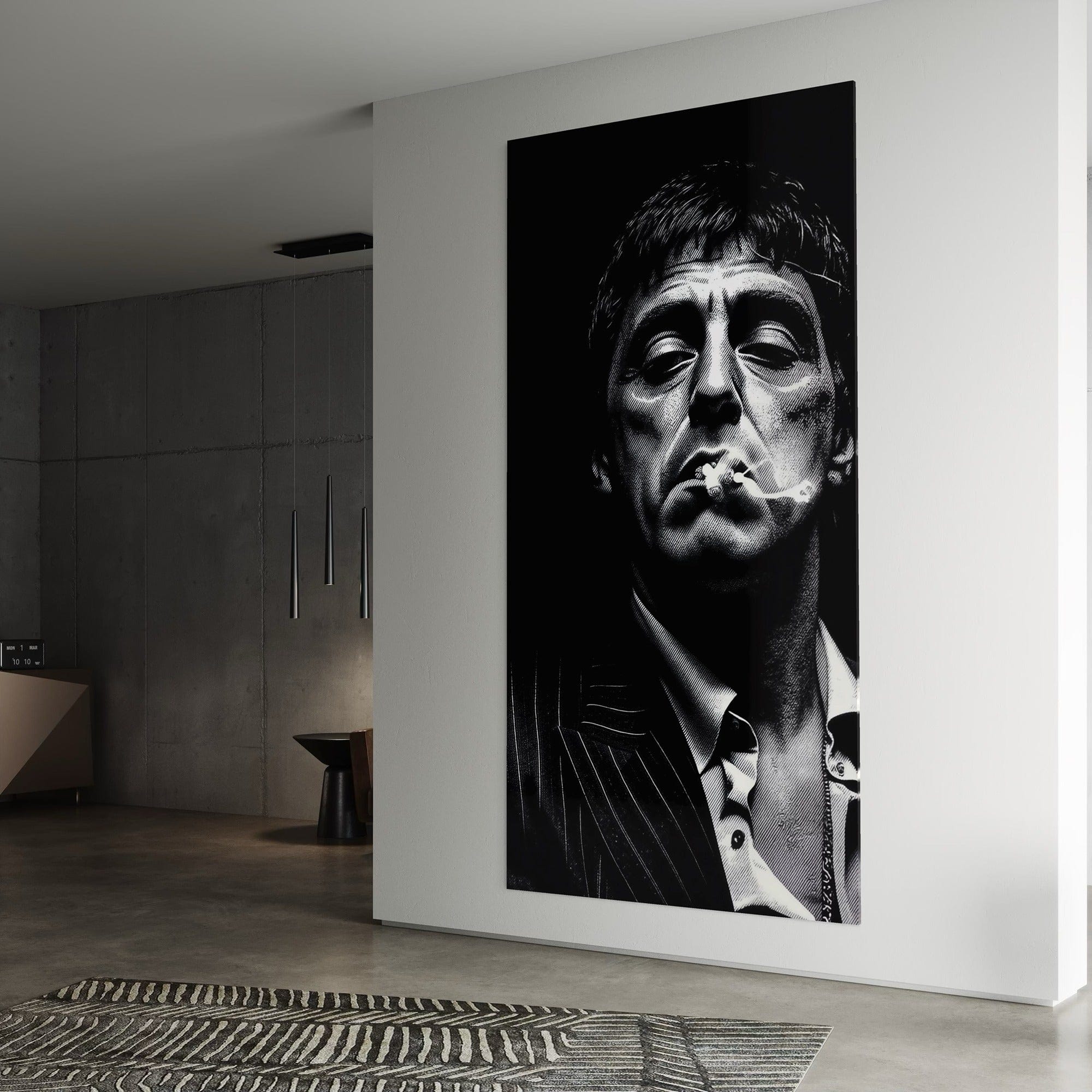Large black and white portrait of a man smoking a cigarette on a wall in a modern interior setting.