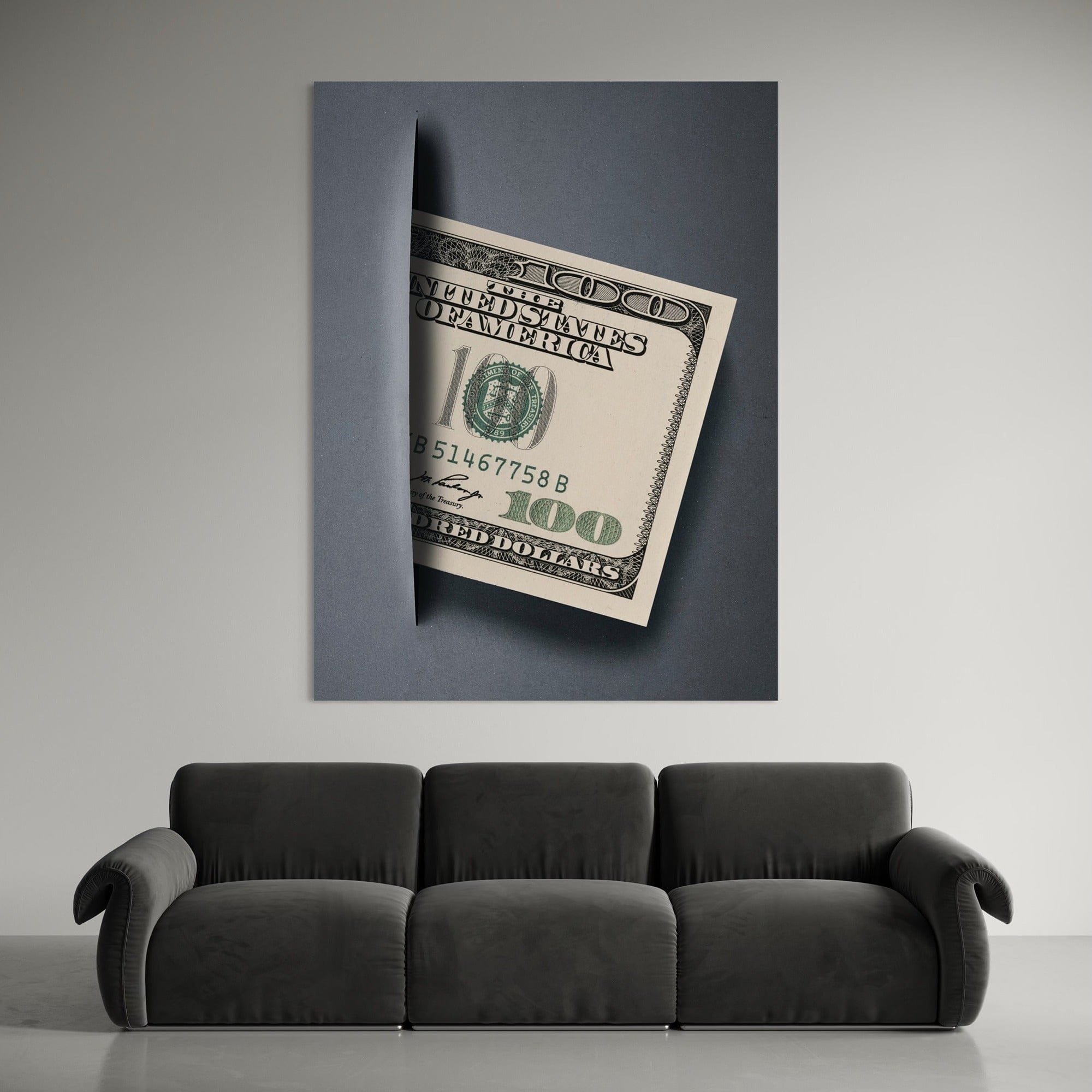 Framed money themed artwork displayed above contemporary desk setup