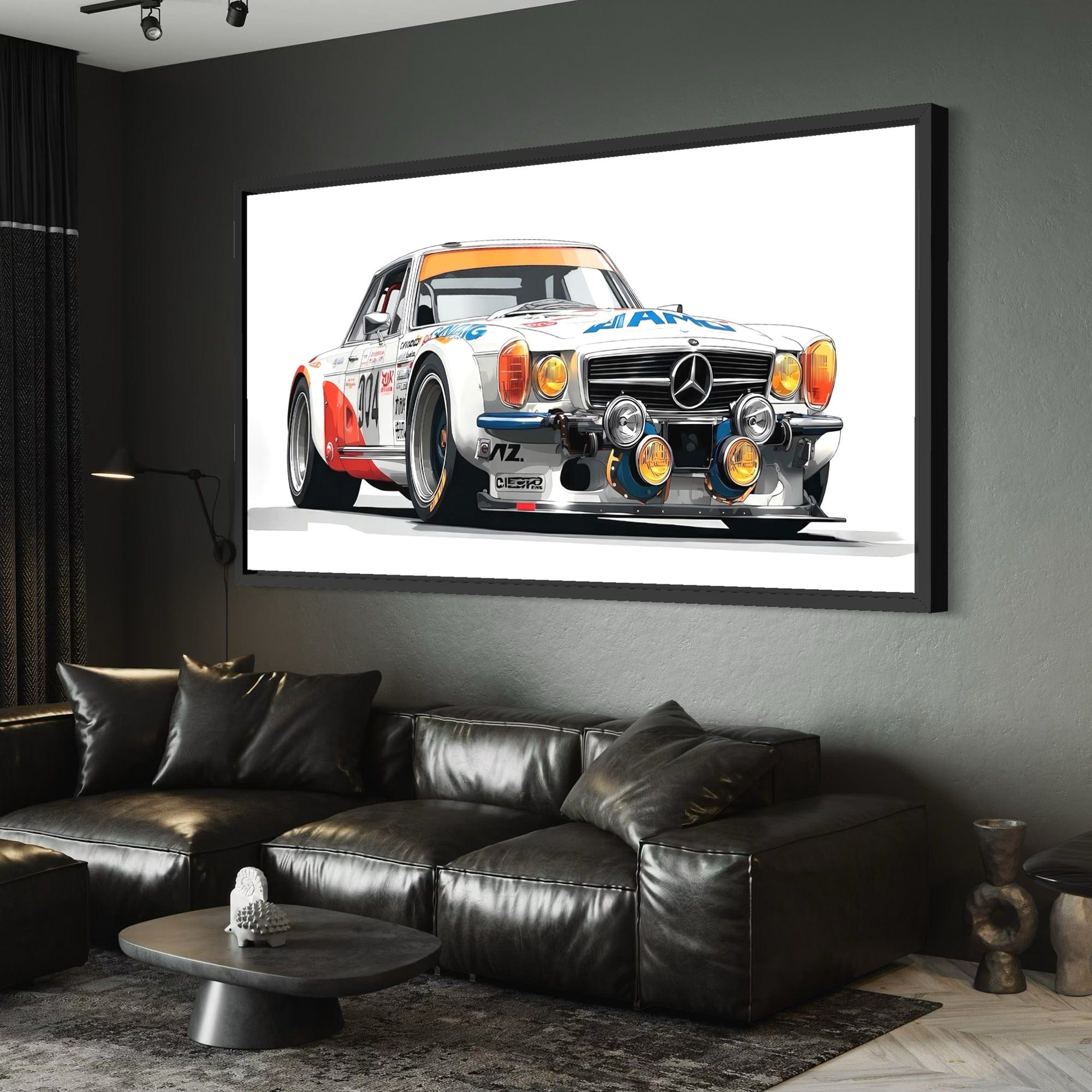 Framed classic motorsport artwork displayed above contemporary sofa setup