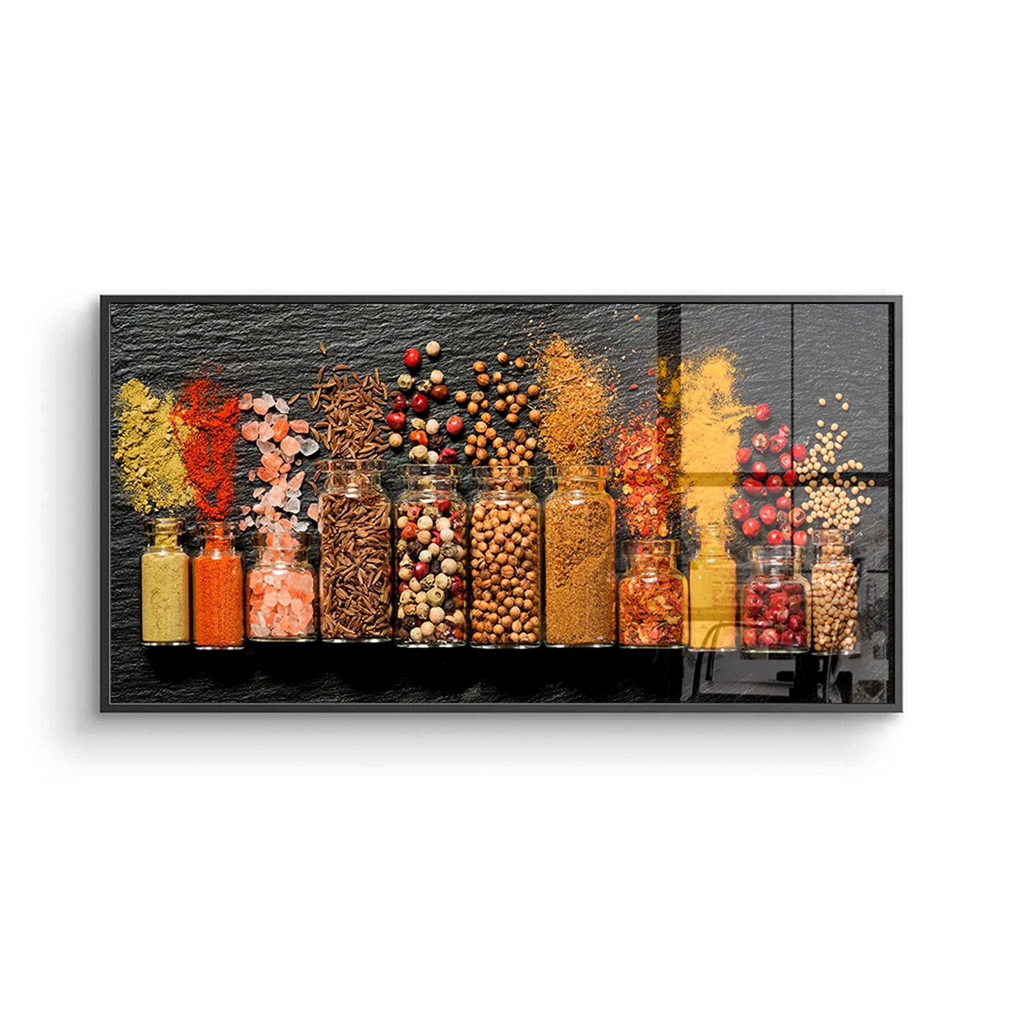 Assorted spices on black slate canvas print